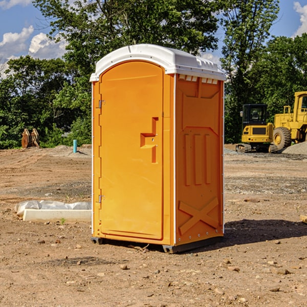 how often are the porta potties cleaned and serviced during a rental period in Runaway Bay